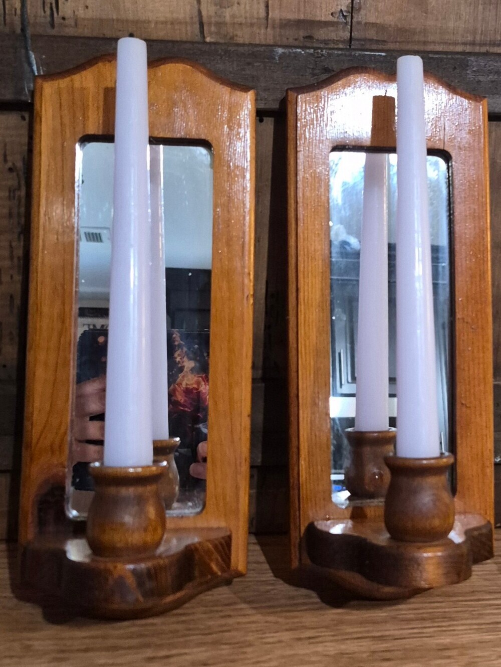 Pair of Vintage Wooden wall-mounted candle sconces featuring a mirrored back